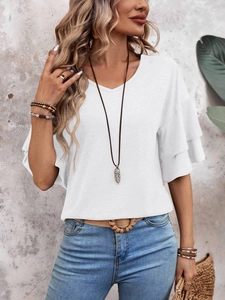 Detailed close-up of double-layered ruffle sleeves on this white V-neck summer T-shirt