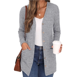 Women's casual grey knit cardigan with V-neck, buttons and pockets in a loose fit style