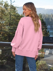 Rosa Oversized Y2K Sweatshirt mit sichtbaren überschnittenen Schultern und Rippenbündchen