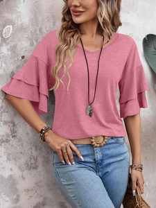 Detail view of V-neck top with double-layer ruffle sleeves in dusty pink fabric