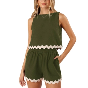 Women's 2-piece olive linen set with sleeveless crop top and white scallop trim shorts