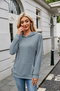 Close-up of women's light blue ribbed knit hoodie featuring a kangaroo pocket and drawstring