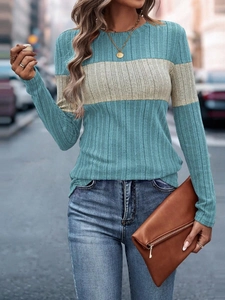 Close-up of color-block striped knit sweater texture and casual autumn fashion style