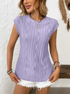 Macro detail of lavender knit tank top showing intricate hollow diamond patterns and texture