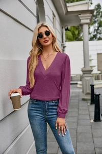 Detail of purple V-neck long sleeve top with pleated cuffs for women's casual wear