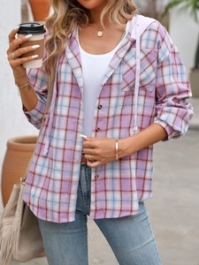 Detail of soft pastel plaid shirt featuring a matching drawstring hood and button-up front