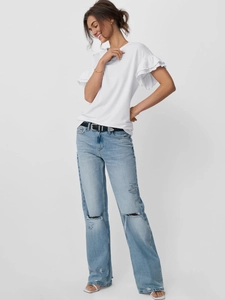 Detail of elegant ruffle sleeves on a white crew neck tee with casual ripped jeans