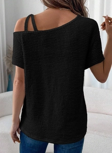 Detail of black waffle knit texture on cold shoulder short sleeve top for women