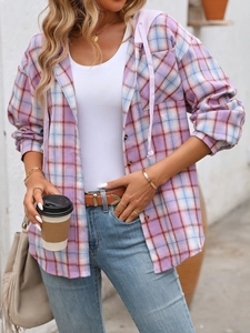 Close-up detail of oversized plaid hooded shirt with purple drawstrings and large pockets