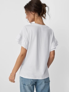 Detail view of white T-shirt featuring double-layered ruffle sleeves and premium fabric texture