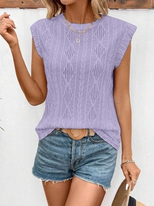 Detailed macro view of light purple jacquard knitted vest with textured diamond pattern