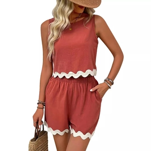 Bohemian two-piece linen set with scalloped trim, crop top and shorts in rust red
