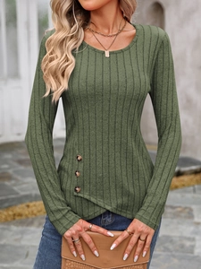 Detail of olive green ribbed long sleeve top with decorative buttons on asymmetrical hem