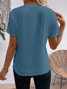 Detail view of the back of a Morandi blue round neck short sleeve T-shirt for women