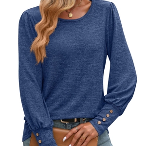 Navy blue puff sleeve knit top for women with elegant decorative buttons on the cuffs