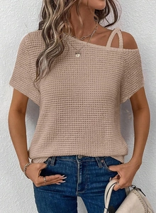 Detail of apricot waffle knit fabric and asymmetrical off-shoulder design with double straps