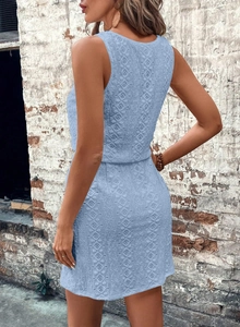 Detailed back view of light blue sleeveless lace mini dress with hollow flower texture