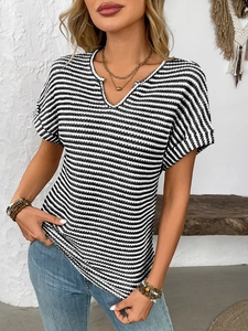 Detail of V-neckline and breathable striped knit fabric on casual women's short sleeve tee