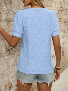 Rear view of light blue short-sleeve top with diamond-shaped hollowed-out eyelet texture