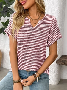 Detail of red and white striped knit fabric and V-neckline on women summer casual T-shirt