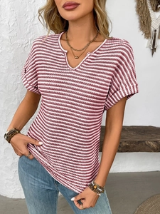 Close-up of women's V-neck striped T-shirt showing detailed waffle knit fabric texture