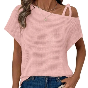 Pink waffle knit short sleeve top with cold shoulder design and asymmetrical straps