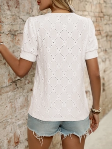 Detailed back view of white short sleeve top with hollow diamond knit texture and round neck