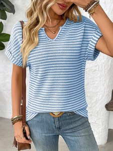 Detail of V-neckline and blue white striped knit fabric texture on summer casual T-shirt