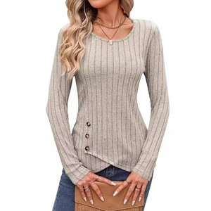 Slim fit long sleeve knit top with ribbed texture and decorative side buttons in beige