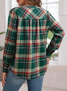 Detail of dark green plaid shirt back with classic box pleat for comfort and fit