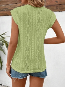 Close-up of avocado green summer knit top with diamond hollow texture and sleeveless detail