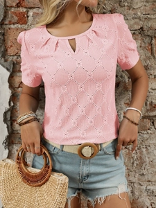 Detail of pink short sleeve top with hollow diamond texture and crew neck design