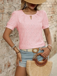 Close-up of pink hollow-out short sleeve top with drop neckline and diamond texture