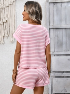 Detail showing knit texture of pink and white striped two-piece summer casual set