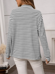 Detail view showing the back profile and texture of a striped long-sleeved casual shirt