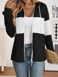 Detail of color-block ribbed knit texture and white drawstring on hooded zip-up cardigan