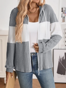 Close-up of three-tone gray and white color block zip-up cardigan with ribbed texture
