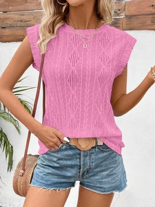Pink knit sleeveless top featuring diamond jacquard texture and ruffled shoulder details