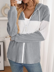 Close-up of the ribbed knit fabric and zipper detail on the grey colorblock hoodie