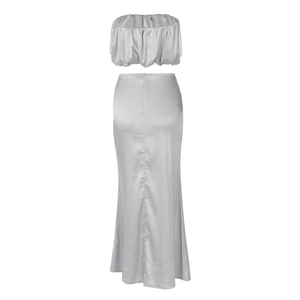 Detail of silver satin two-piece set featuring off-shoulder top and maxi skirt