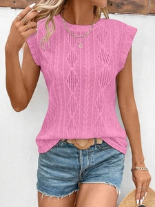 Close-up of pink knit sleeveless top with diamond hollow-out texture and round neck