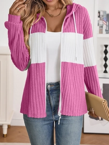 Detail of pink and white color block striped knit hoodie with zipper and drawstring