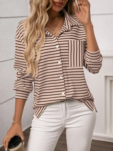 Close-up of waffle knit texture and chest pocket on striped apricot pink long sleeve shirt