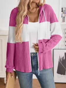 Detail of pink and white color block ribbed sweatshirt with white zip and drawstring