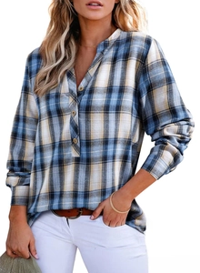 Detail of V-neck plaid shirt featuring classic wooden buttons and woven fabric texture