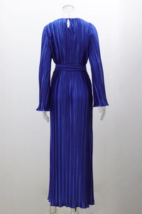 Detail of royal blue pleated dress featuring a back teardrop cutout and silk-like satin texture