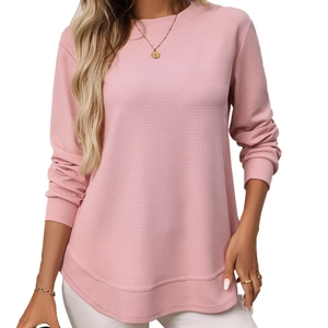 Women's pink waffle knit long sleeve T-shirt with curved hem and crew neckline