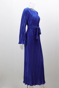 Detail of navy blue pleated dress fabric with long sleeves and matching waist belt