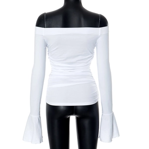 Close-up of white off-shoulder top with waist ruching and flared bell sleeves