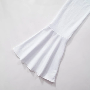Detailed macro shot of white bell sleeve cuffs with fine overlock edge stitching